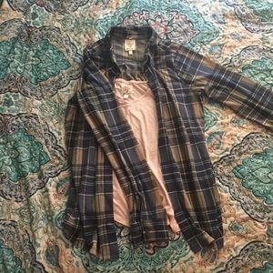 Flannel w/ built in tank. Comes with choker
